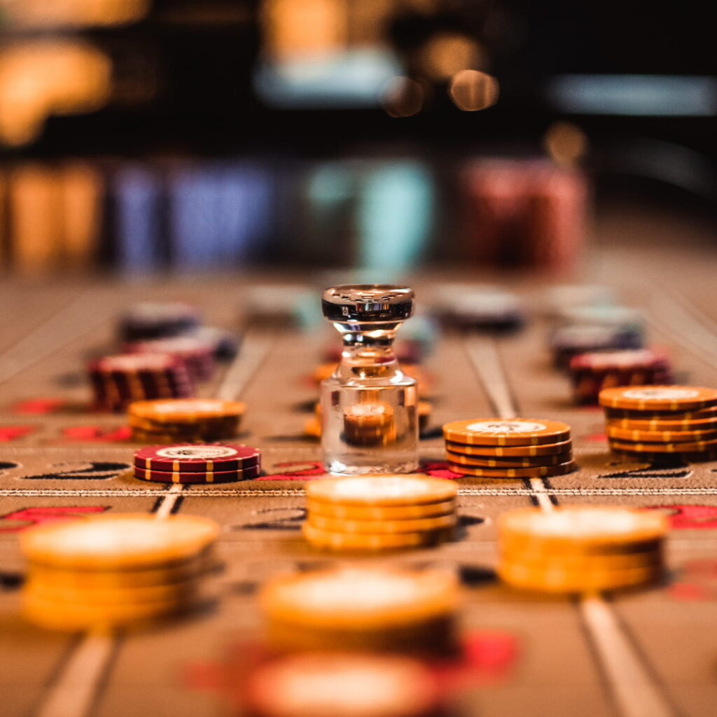 Palm Beach Casino chips on table